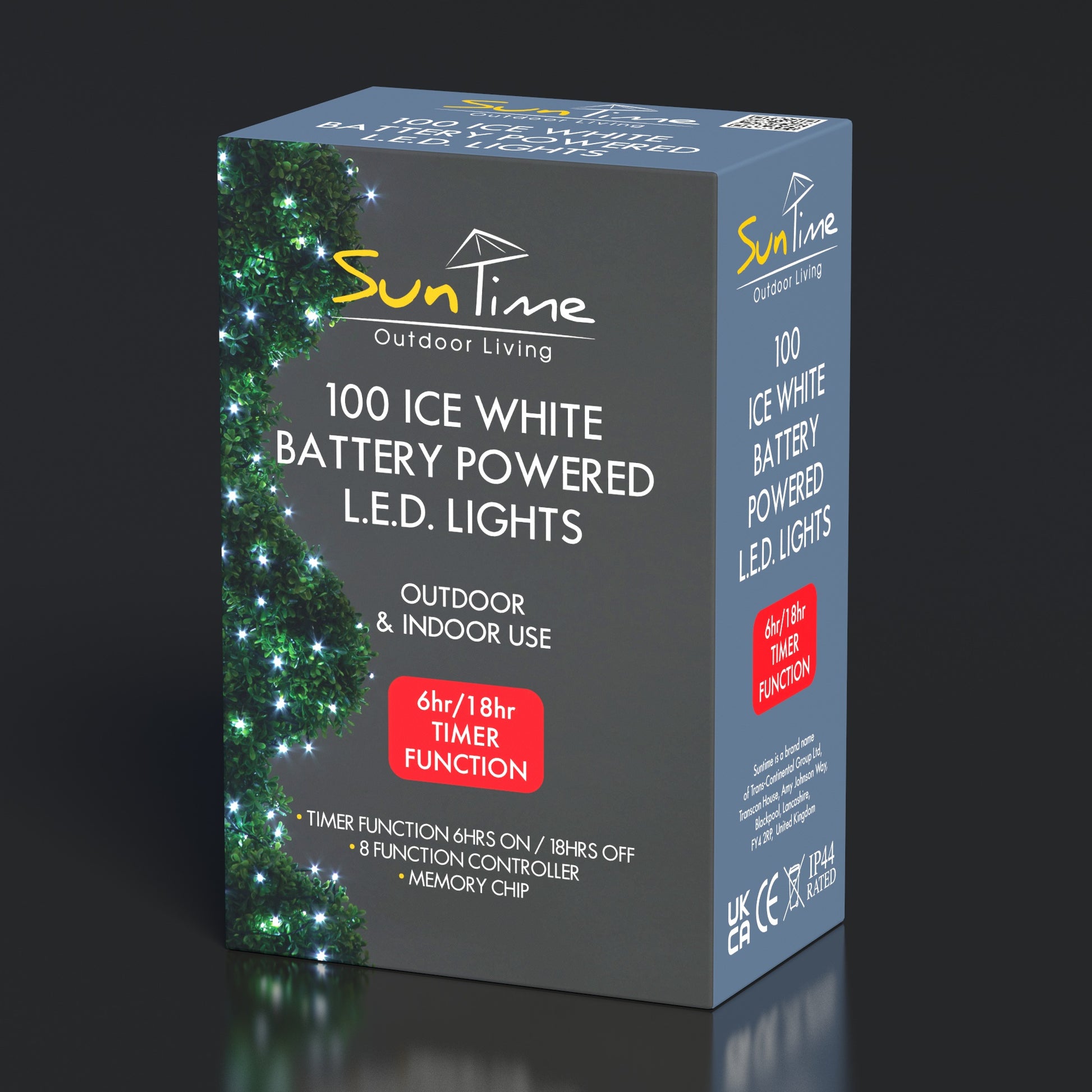 Box of SunTime outdoor LED lights with green string lights on a dark background
