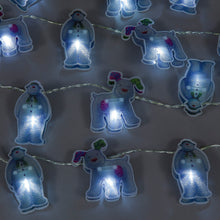 String lights shaped like cartoon dogs on a dark background