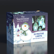 Box of 'The Snowman and the Snowdog' festive lights with snowman and dog illustration on a dark background.