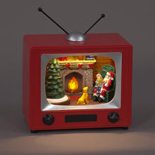 Red vintage-style TV with a Christmas scene inside, featuring Santa Claus and a dog by a fireplace.